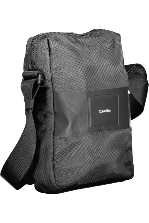 calvinkleintracollauomonero_3 calvinkleintracollauomonero_3